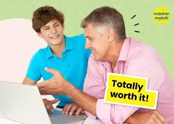 a man and boy looking at a laptop