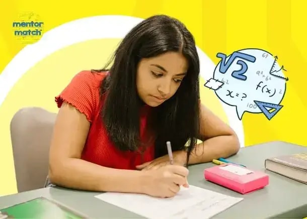 a woman writing on a piece of paper